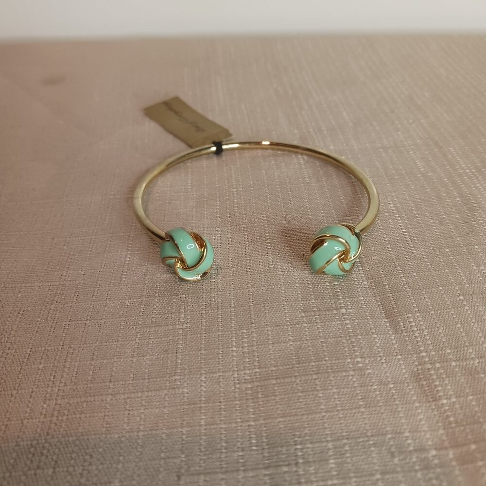 Best of Everything Gold Tone Knot Bangle